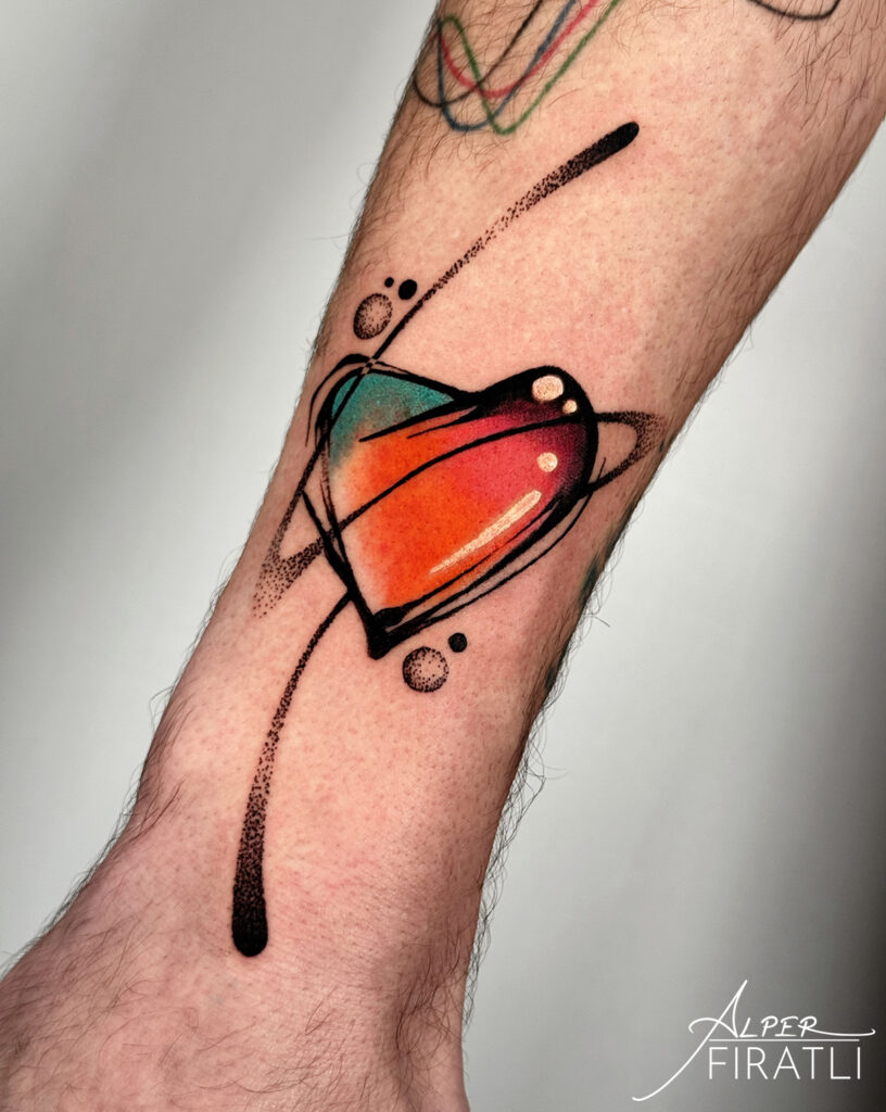abstract heart shape illustrative color tattoo on forearm